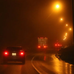 moody photo of late night driving